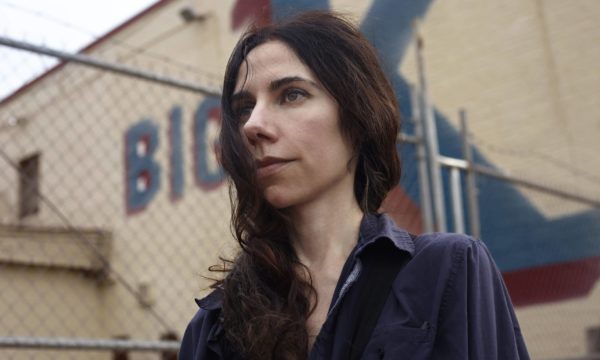 PJ Harvey as featured in Seamus Murphy's film   "A Dog Called Money". His feature documentary on their collaboration traces the sources of the songs that were inspired by their travels, and tells stories of the some of the people and places they encounted along the way.